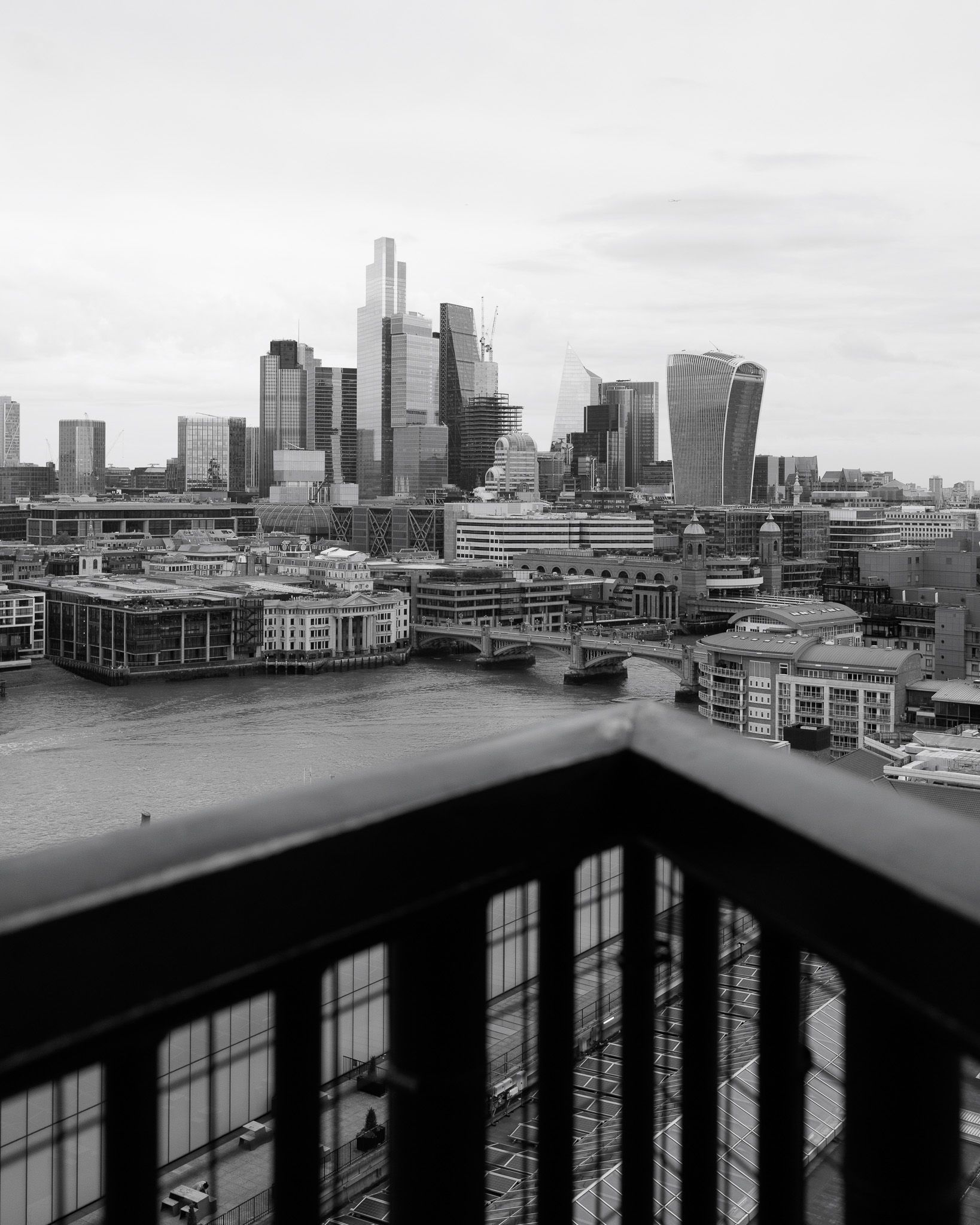 Skyline of the City of London with skyscrapers and the Thames from the Tate Modern terrace